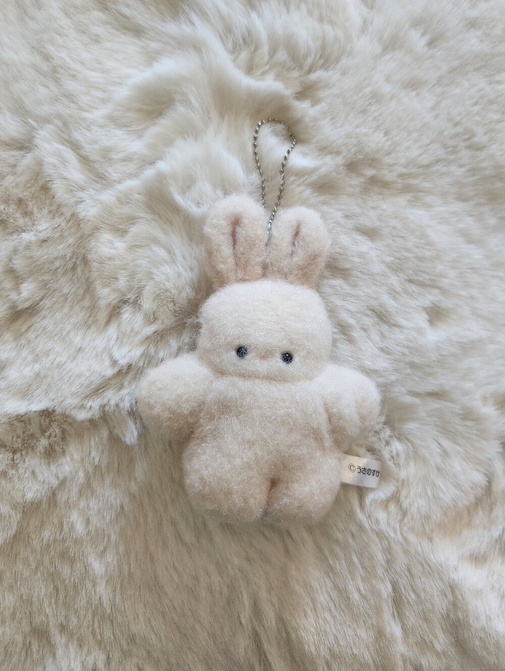 Cream fluffy bunny plushy keychain I got from Japan